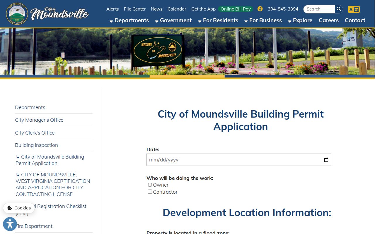 Moundsville property records: city building-permit form and flood-hazard acknowledgement